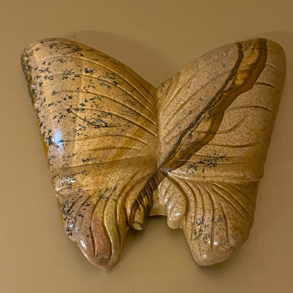 Carved stone butterfly